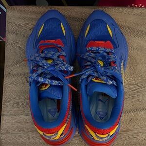 SUPERMAN DC JUSTICE LEAGUE X Puma Blue Sneakers with Red and Yellow Accents